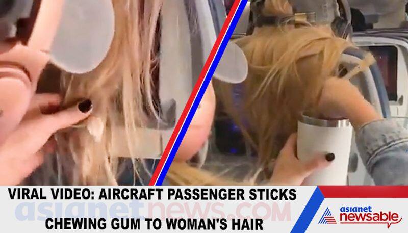 Viral video: Aircraft passenger sticks chewing gum to woman's hair-tgy