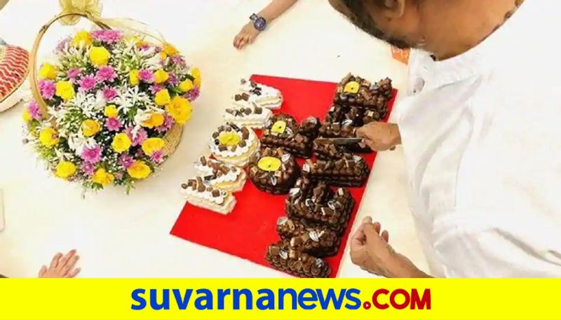 Rajinikanths birthday cake spells out his political intent to those waiting dpl