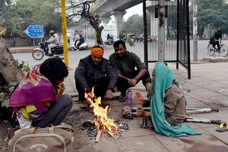 Bone chilling cold wave makes life tough for people in Delhi, Uttar Pradesh