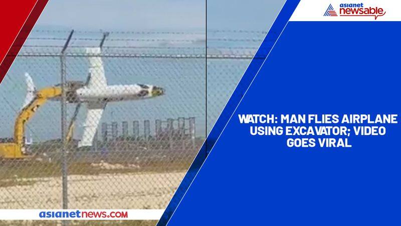 Watch Man flies airplane using excavator; video goes viral-TGY