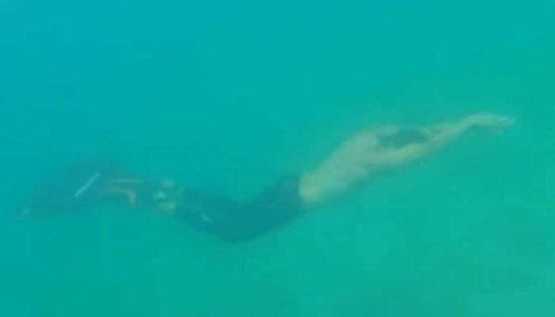 Man swims 662 feet underwater on just one breath