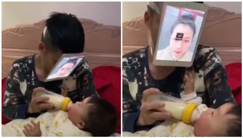 Genius dad tapes tablet with wife's picture on face to feed baby it works like a charm