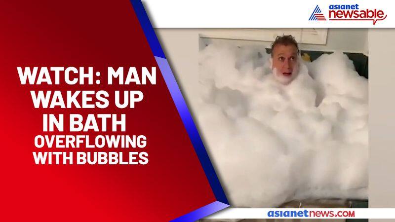 After falling asleep man wakes up in bathtub overflowing with bubbles: Watch the video - gps