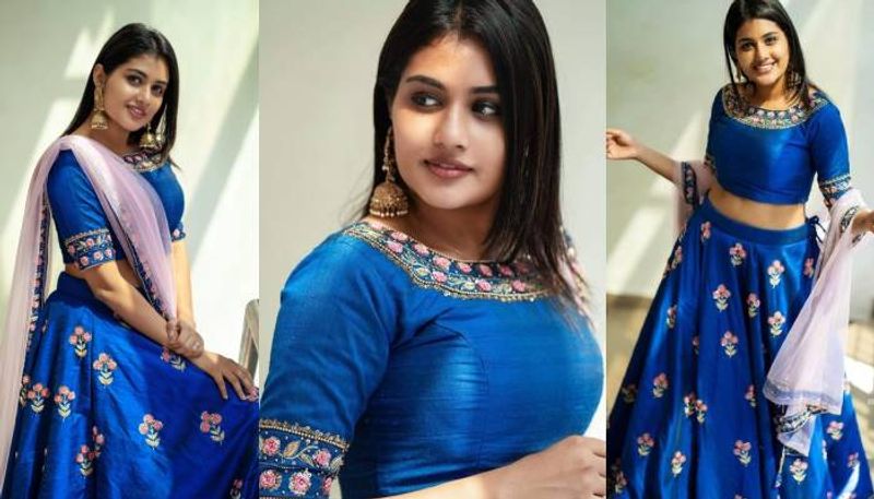 Alina Padikkal in blue lehanga