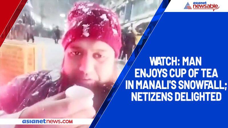 Watch Man enjoys cup of tea in Manali's snowfall; netizens delighted-tgy