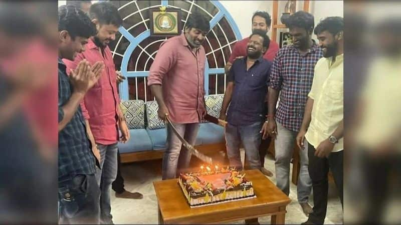 Vijay makkal iyakkam executive and vijay fans cutting a birthday cake with a sword in Madurai is currently going viral on social media