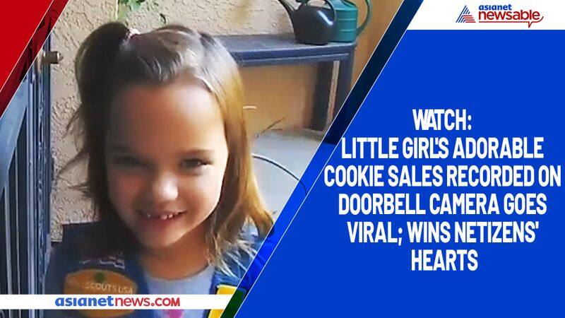 Watch Little girl's adorable cookie sales recorded on doorbell camera goes viral; wins netizens' hearts-tgy