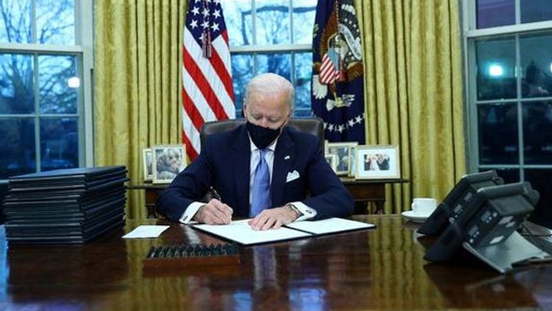 US President Joe Biden signs raft of COVID orders; passengers to quarantine on arrival, wider mask mandate-dnm