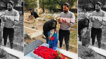 Sons infinite love for his father Cricketer Mohammed Siraj rushes to fathers grave upon landing in hometown