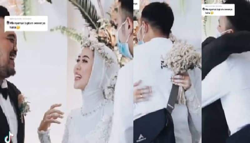 Bride asks for husbands permission to hug exboyfriend at their wedding