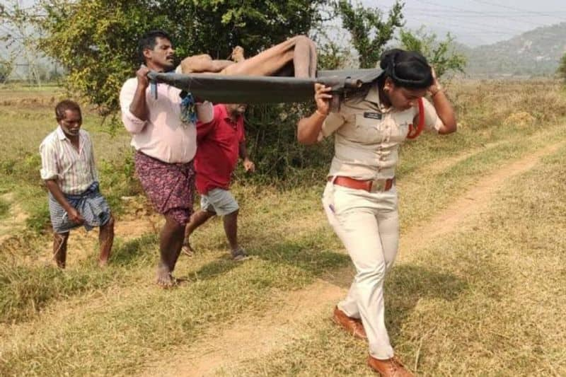 Woman cop carries dead body for two kilometres in Srikakulam