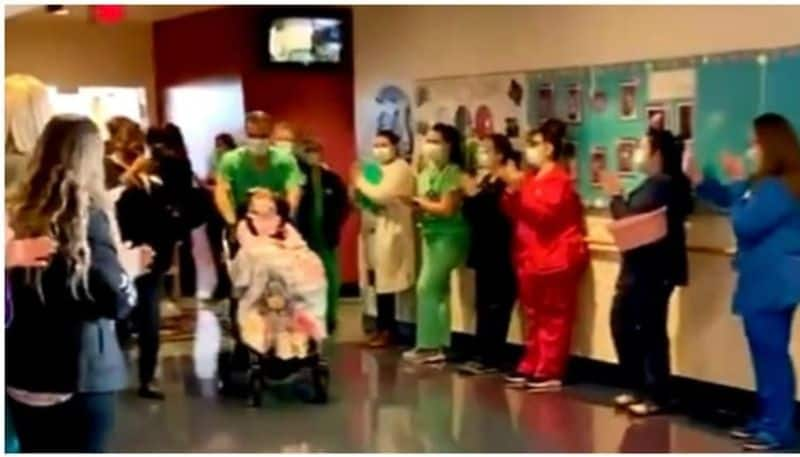 Healthcare workers clap for 4-yr-old girl after she recovers from Covid-19. Viral video