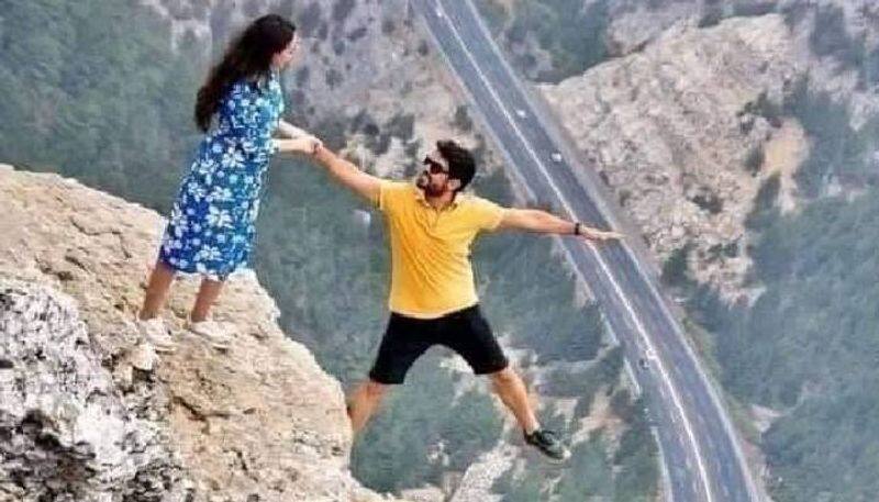 Couple Poses On Cliffs Edge In Viral Pic