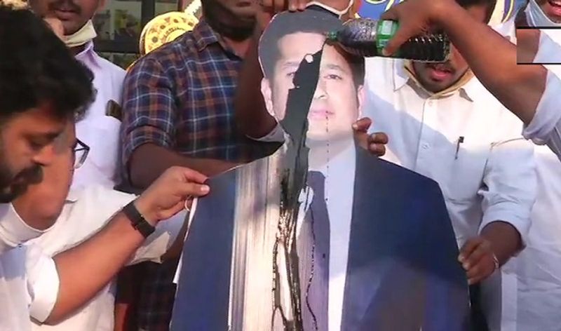 Kerala Youth Congress Workers poured black oil on Sachin Tendulkar cut out for tweet on farmers protest ckm