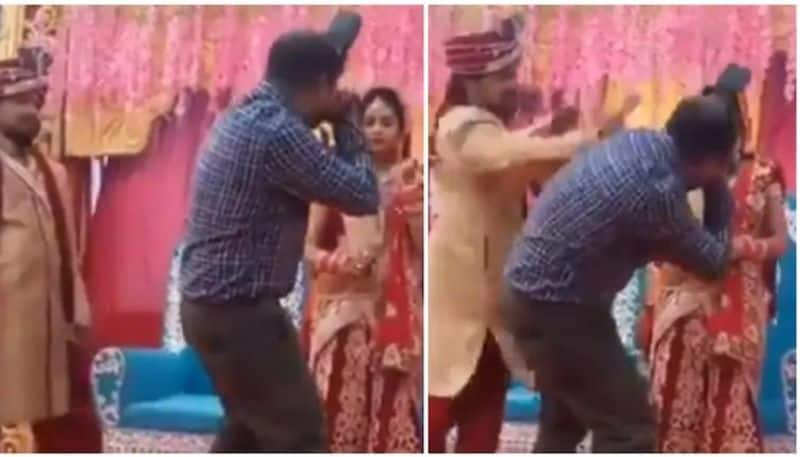 Groom beats photographer during wedding photoshoot in viral video. See bride's reaction