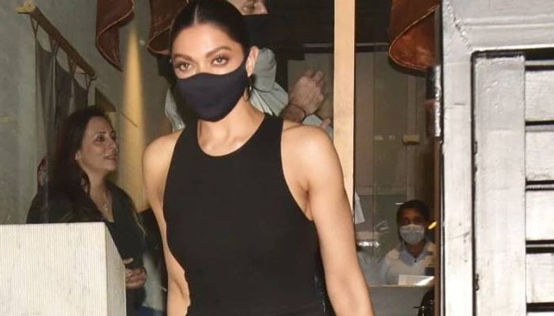 Deepika Padukone in black bodysuit with black mask