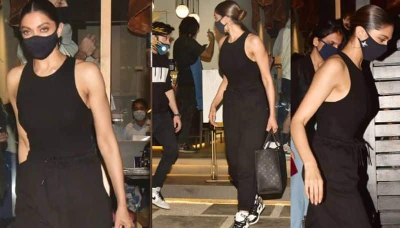 Deepika Padukone in black bodysuit with black mask