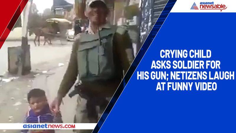 Crying child asks soldier for his gun; netizens laugh at funny video-TGY