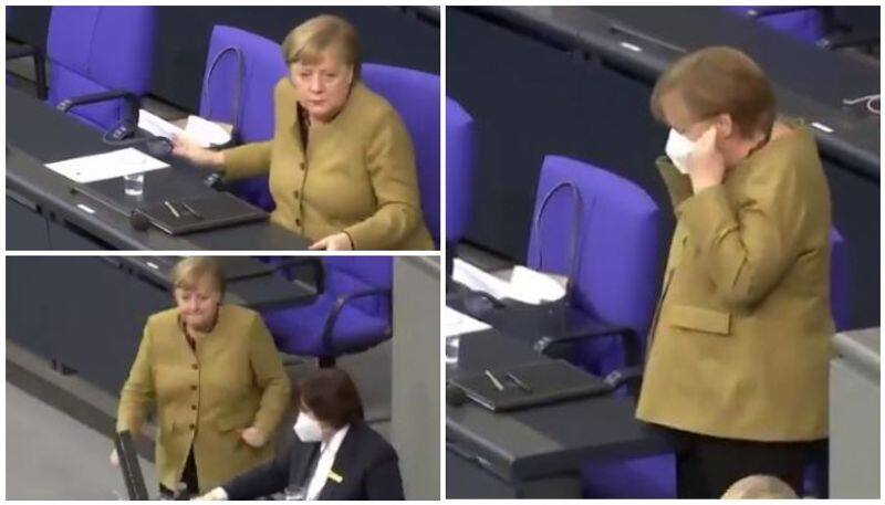 German Chancellor Angela Merkel panics after forgetting her face mask