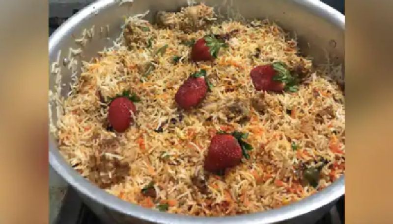 protest from biryani lovers as man prepares strawberry biryani