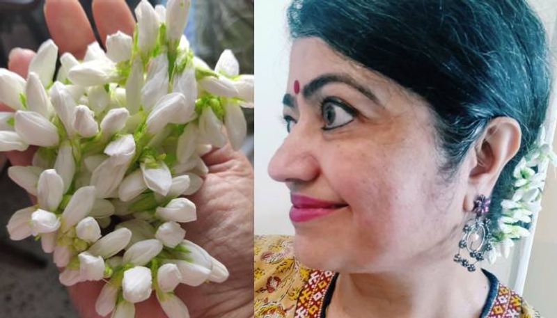 Mom uses tissue paper to create jasmine flower