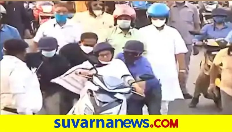 After Tejashwi Yadav Tractor Ride Mamata Banerjee Scooter Spin pod