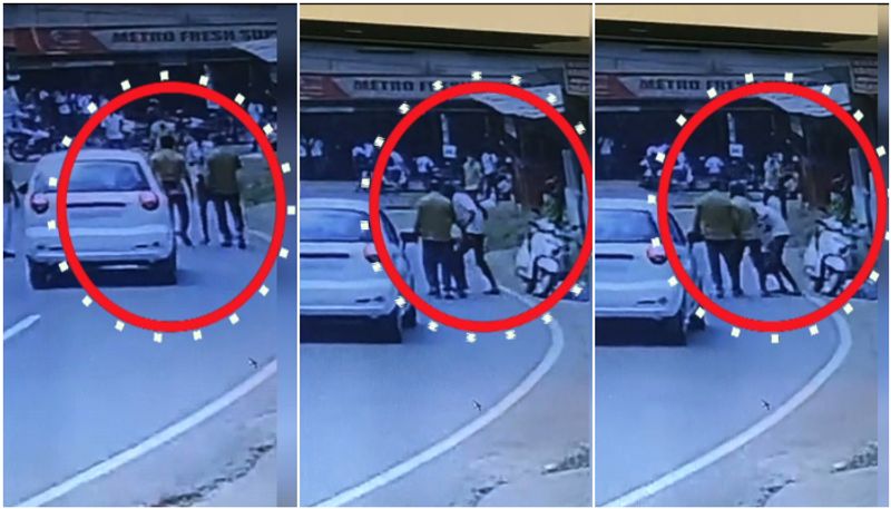 student beaten up by auto driver in roadside kannur cctv visuals