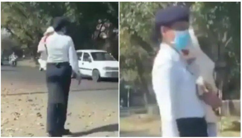 Chandigarh cop controls traffic with baby in her arms