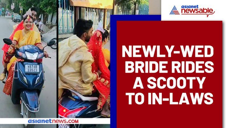 Newly-wed bride rides a two-wheeler; Watch this daring video - gps