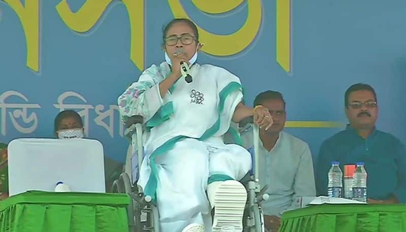 Sitting in wheelchair, Mamata addresses rally in Purulia