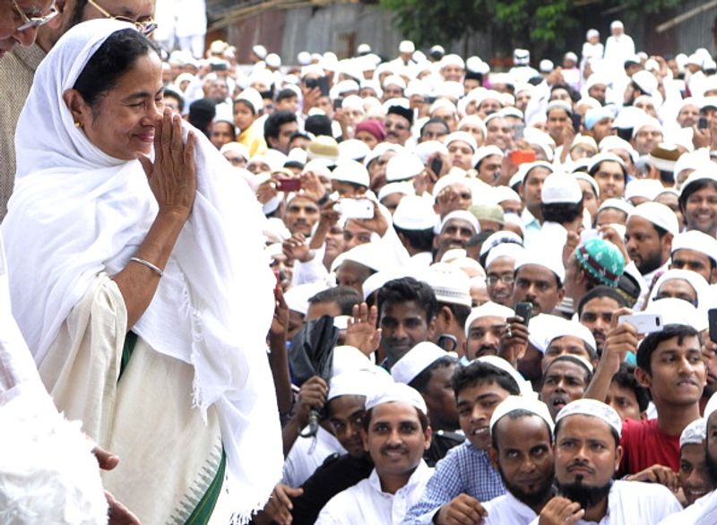 Mamata releases Trinamool's manifesto, promises minimum monthly income