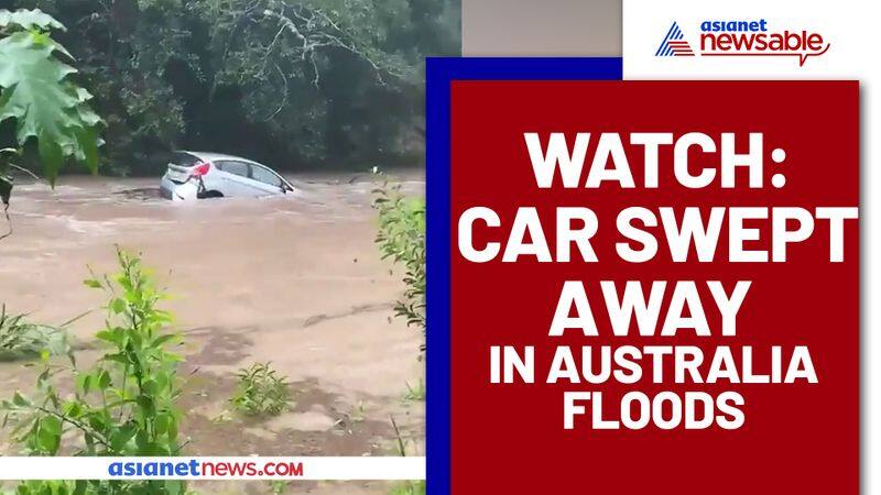 Car washed away in floods; Australian PM tweets with advisory - gps