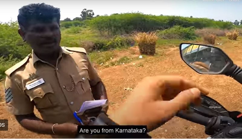 Tamil Nadu police stops karnataka biker in for a heartwarming reason video goes viral ckm