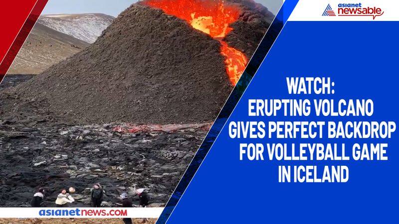 Watch Erupting volcano gives perfect backdrop for volleyball game in Iceland-tgy