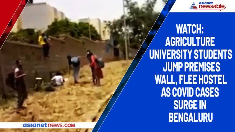 Watch  Agriculture University students jump premises wall, flee hostel as Covid cases surge in Bengaluru-ycb