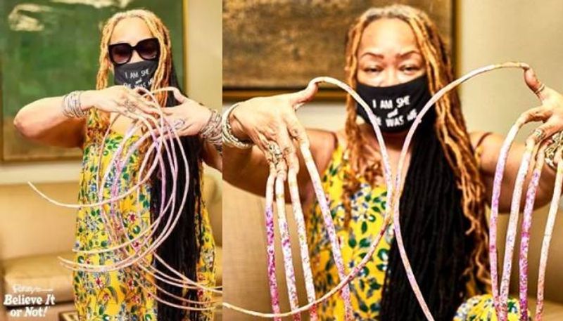 woman with Worlds Longest fingernails cuts them after 30 years