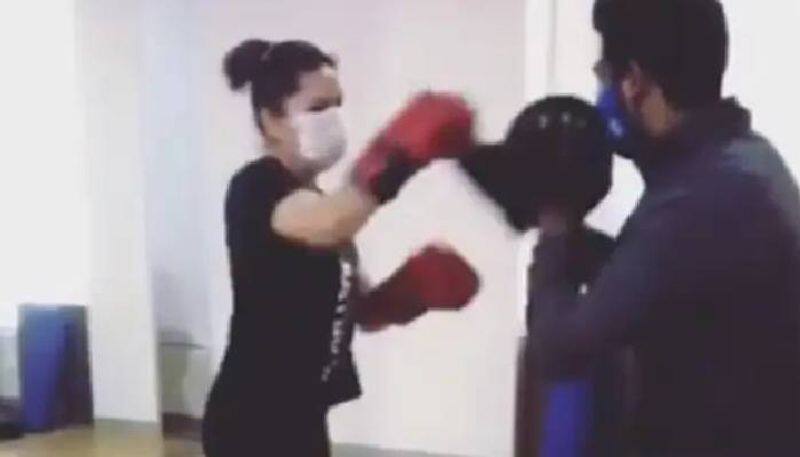 Sunny Leone s  Boxing With Her Mask On