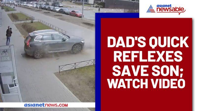 Dad saves son from an out-of-control car; Watch Viral Video - gps