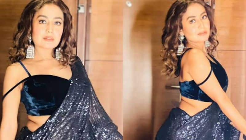 Neha Kakkar glitters in shimmer saree