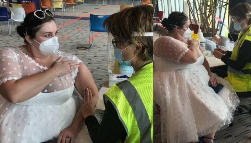 woman wears her wedding gown to get Covid vaccine