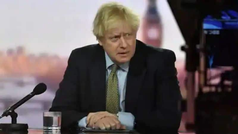 UK PM Boris Johnson warns of looming tidal wave of Omicron sets target for booster jab gcw