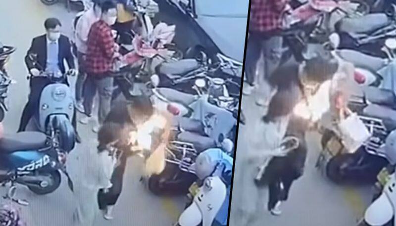 Mobile Phone bursts into flames inside man's bag, Watch the viral video - gps