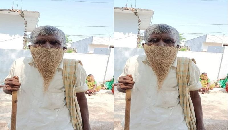 Mekala Kurmayya came to mandal center for a pension wearing a bird-nest as a mask - bsb