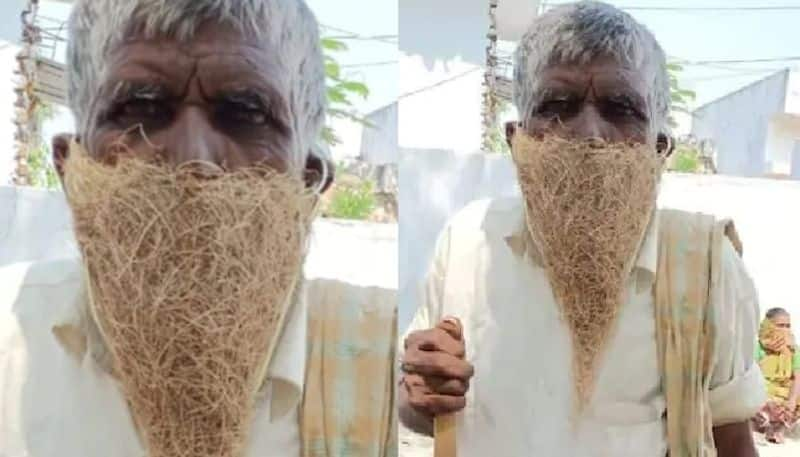 old man wears nest instead of mask