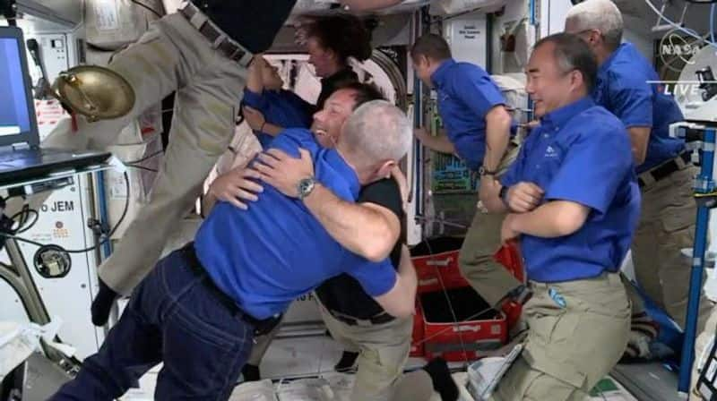 SpaceX capsule with four NASA astronauts aboard docks with International Space Station