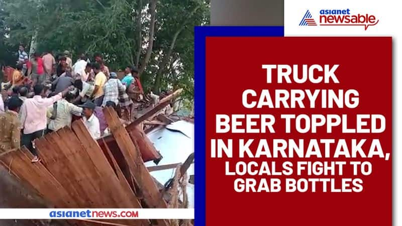 Truck with beer overturns, locals gathered to collect bottles violate COVID-19 norms (Watch Video) - gps