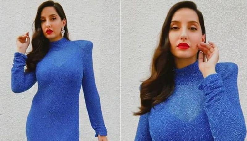 Nora Fatehi in blue bodycon dress