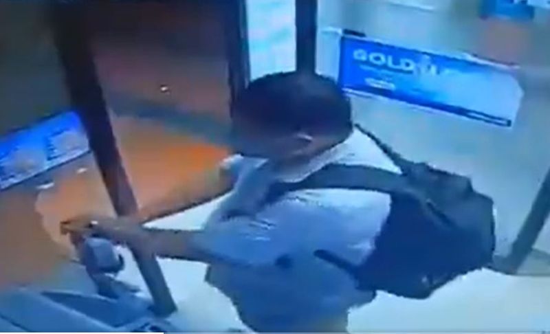 Coronavirus 2nd wave in India Man stealing sanitizer from ATM video goes viral ckm