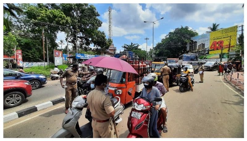 covid19 vehicle inspection Kilometers of traffic jams in thiruvananthapuram