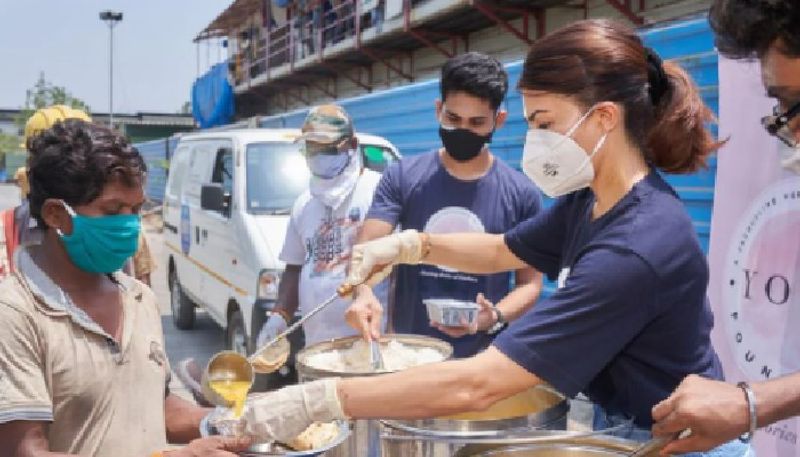 jacqueline fernandez shares pics of herself serving food to the needy